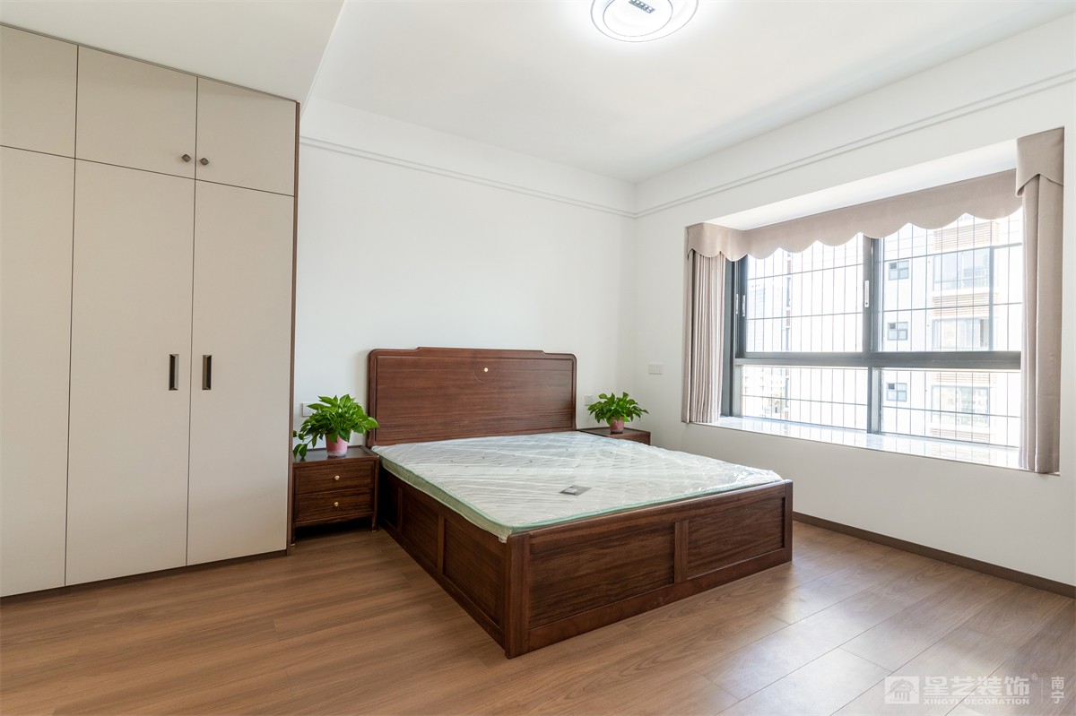 津頭小區(qū)140平原木風(fēng)臥室完工實景圖